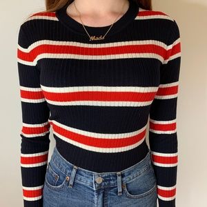 Long sleeve striped shirt.